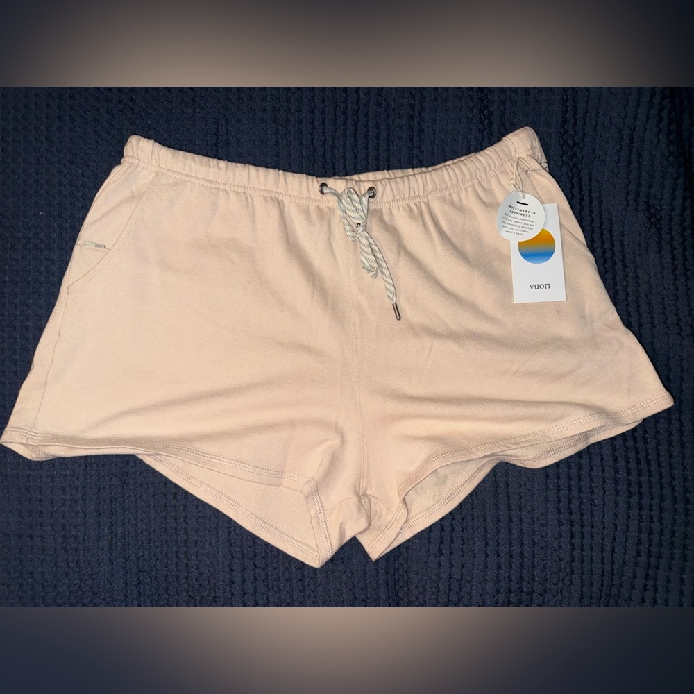 Vuori Women's Athletic Shorts in Light Cream